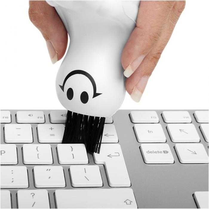 Antistresová figurka s kartáčem na klávesnici